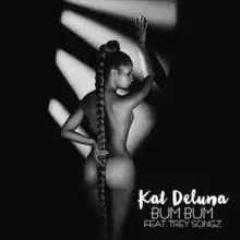 A black and white photo of a naked woman with her back to the camera. She has a long ponytail that covers her butt with the words "Kat DeLuna" in a bold white font and the words "BUM BUM FEAT. TREY SONGZ" in a faint white font in the lower right-hand corner.