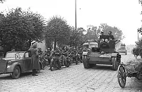 22 September 1939: Soviet T-26 passes German Opel Olympia.