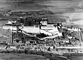 The Potala Palace in 1938 with the inner and outer parts of Zhol village in the lower foreground.