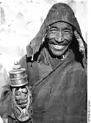 Monk with prayer wheel. 1938