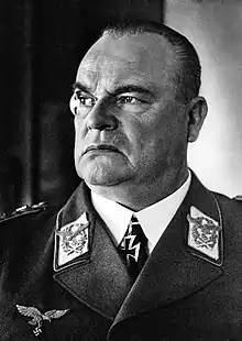 Head-and-shoulders portrait of a uniformed Nazi German air force general in his 50s wearing an Iron Cross