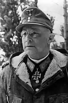 a black and white image of a male in uniform