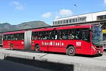 Red articulated bus