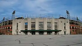 The façade of a concrete, brick, and steel and concrete ballpark