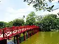 Thê Húc Bridge leads to the temple