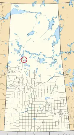 A map of the province of Saskatchewan showing 297 rural municipalities and hundreds of small Indian reserves. One is highlighted with a red circle.