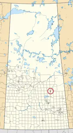 A map of the province of Saskatchewan showing 297 rural municipalities and hundreds of small Indian reserves. One is highlighted with a red circle.