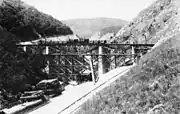 The Zlaşti valley viaduct under construction when they performed load trials (August 1900)