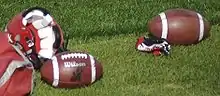 Image 28Footballs and a helmet at a Calgary Stampeders (CFL) team practice (from Canadian football)