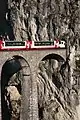 Glacier Express panorama cars entering the Landwasser Tunnel.