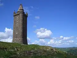 Scrabo Tower has a conical cap-house above its spiral staircase, with conical turrets on the other three corners