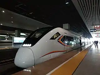 An intercity train (CRH6A EMU) at the station