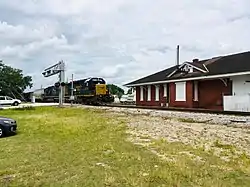 CSX train passing the historic Fort Meade Depot on the former Charlotte Harbor Division