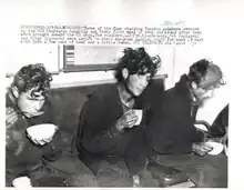 Kryuchkovsky,  Poplavsky, Ziganshin consuming some soup and bread shortly after being rescued.