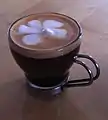 Double shot macchiato with a little foam, in glass, in Natick, Massachusetts