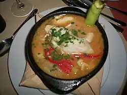 Caldillo de congrio served in a paila