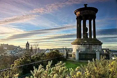 Image 21Calton Hill is a hill in central Edinburgh, just to the east of the New Town. The hill is home to several iconic monuments and buildings: the National Monument, Nelson's Monument, the Dugald Stewart Monument, the Royal High School, the Robert Burns Monument, the Political Martyrs' Monument and the City Observatory.Photo credit: Andrewyuill