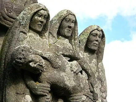 The calvary's 'Pietà'. The Virgin Mary and two femaie saints support Jesus' body which has just been brought down from the cross.