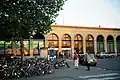 Cambridge railway station and bicycle stands at the eastern end of Station Road.