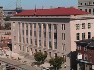 Image 28Federal Courthouse in Camden, which is connected to Philadelphia via the Benjamin Franklin Bridge in the background (from New Jersey)