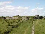 View looking towards the fortress from the south east from the remains of the Caponier