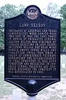 Photo shows a historical plaque titled CAMP NELSON.