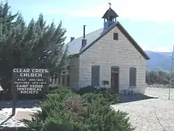 The Clear Creek Church was built in 1898 and is located on Clear Creek Road 3.5 mi. SE of Camp Verde.  The builders placed in the cornerstone of the building a bible and a $5 gold piece (which was chiseled away in the 1920s). It was Camp Verde’s only church until 1913, when it was transformed into the city’s one-room schoolhouse. In 1946, the church was abandoned. Today Clear Creek Church is looked after by the Camp Verde Historical Society. It was listed in the National Register of Historic Places on August 6, 1975, reference #75000362.