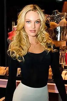 Image 70South African model Candice Swanepoel wearing pantywaist top and bodycon skirt, 2010 (from 2010s in fashion)