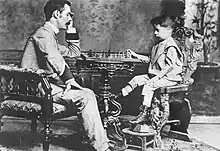 Image 19Capablanca playing chess with his father José María Capablanca in 1892 (from Culture of Cuba)