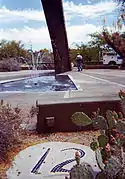 Detail of the 12 o'clock marker with fountain repairman.