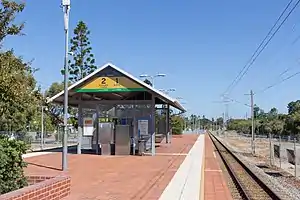 Brick island platform with small shelter on it