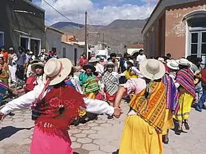 Women wearing aguayos while dancing the Carnavalito in Jujuy, Argentina