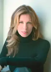 A color photograph of author Carole Radziwill posing for a picture in 2007.