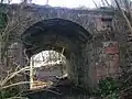 Detail of the bridge and its decoration from the Lugton Water side.