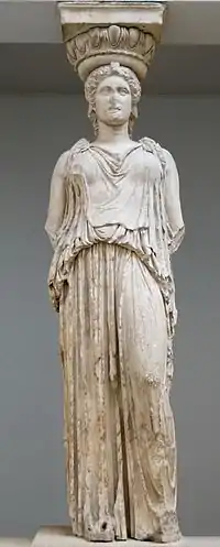 Caryatid from the Erechtheion wearing a peplos. Note the blousing, or kolpos, over the zone