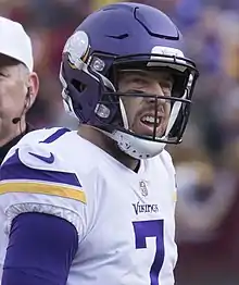 Portrait photo of Case Keenum in his Vikings uniform and helmet