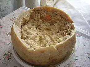 Casu marzu is a traditional Sardinian sheep milk cheese that contains live insect larvae and cheese mites from the cheese flys. A variation of this cheese exists also in Corsica (France), where it is called casgiu merzu and is especially produced in some Southern Corsican villages like Sartene.