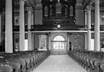 East end of nave showing organ and choir balcony and entrance.