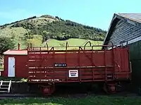 Hc Class cattle wagon HC1018 and ganger's hut (on loading bank) at Little River. A notable omission are the running boards that should be on top of the roof.