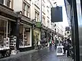 Cecil Court from Charing Cross Road probably circa 2010; Stephen Poole's bookshop is being renovated in the foreground, and first editions specialist Nigel Williams passed away at the early age of 48 on Christmas Eve 2010.