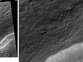 Centauri Montes, as seen by HiRISE.  Scale bar is 500 meters long.  The original enlargement of the image at the left is full of rich detail on all parts of the picture.