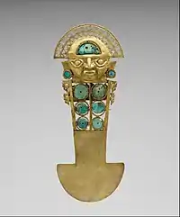 Ceremonial knife/tumi (Sican); 10th–13th century; gold, turquoise, greenstone and shell; height: 33 cm; Metropolitan Museum of Art