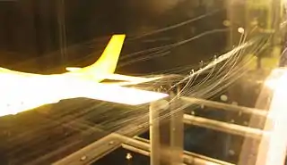 Wingtip vortices from a Cessna 182 wind tunnel model.