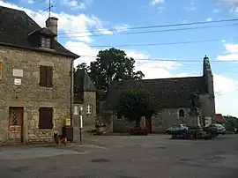 The church and surrounding buildings in Champagnac-la-Prune