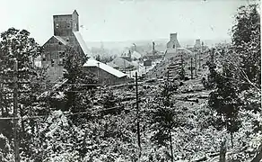 The Champion Mine looking south. “B” Shaft in the foreground,followed by “C” and then “D” in the distance.