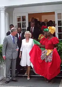 Charles and Camilla stand next to each other