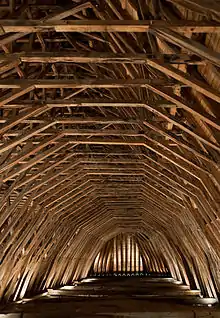 Heart of oak beams of the frame of Saint-Girons church, representing Middle-Age architecture.