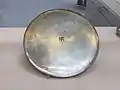 Serving dish decorated with swastika engraved in niello