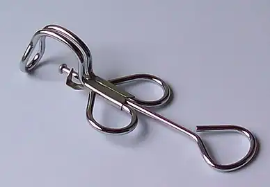 Handheld cherry pitter