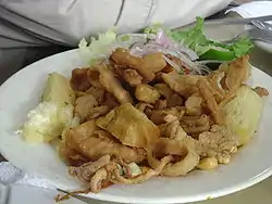 Image 42Chicharrón mixto, is a common dish in the country derived from Andalusia in southern Spain. (from Culture of the Dominican Republic)